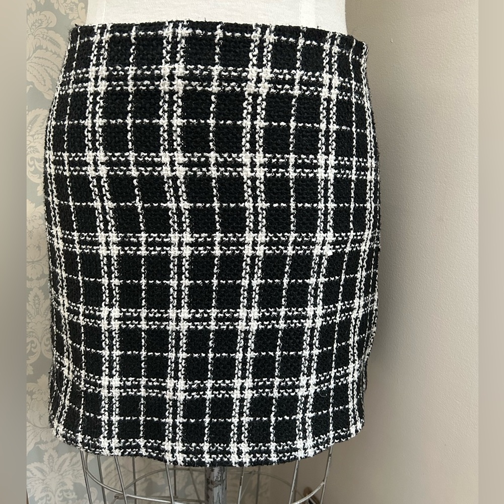 Tweed mini skirt.